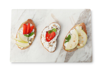 Delicious bruschettas with fresh ricotta (cream cheese), strawberry, mint and pear isolated on white, top view