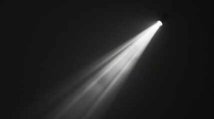 A bright light shining against a black background