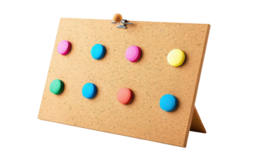 Colorful magnets on a cork board, perfect for decorating and organizing your office or classroom. Vibrant colors add a playful touch.