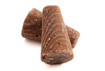 A Raw and Unrefined Mexican Sugar Cane Cone Isolated on a White Background