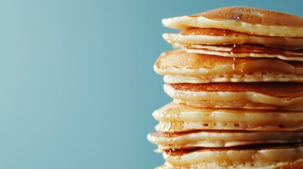 A tall stack of pancakes is perfect for a family breakfast with a shallow depth of field and an empty area for additional content. Generative AI