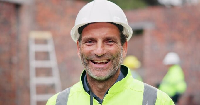 Smile, man and face of mature construction worker on site for building, renovation and project management. Industry, portrait and male contractor in civil engineering for repairs or maintenance.
