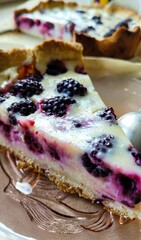 Appetizing beautiful blackberry tart from thin shortbread dough and sour cream