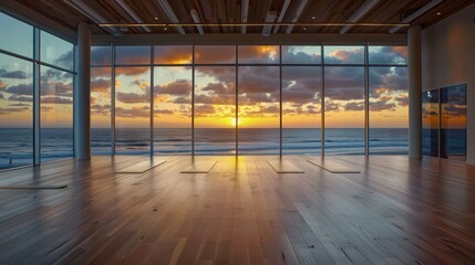 seaside yoga studio with energy-efficient windows that offer stunning views of the sunrise over the ocean while maintaining a serene, climate-controlled environment for practitioners