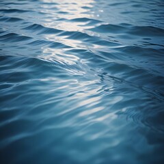 Rippling blue water surface with light reflections
