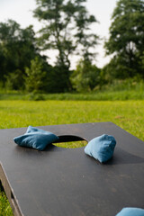 Cornhole bags on a cornhole board close up