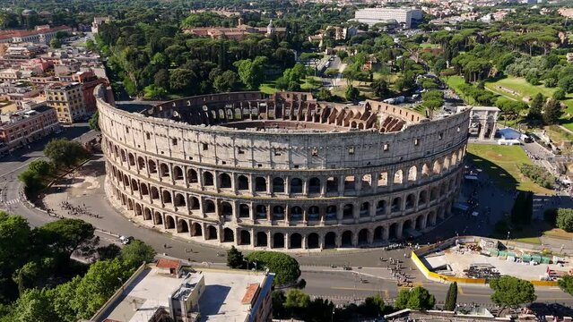 Roman Colosseum aerial view. Flavius Amphitheater is an architectural monument of Ancient Rome, an aerial view. Rome, Italy