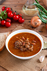 Goulash with vegetables seasoned with paprika and other spices. Perfect for recipe, article, menu book, or any cooking contents. Typical Czech food. Hungarian cuisine.