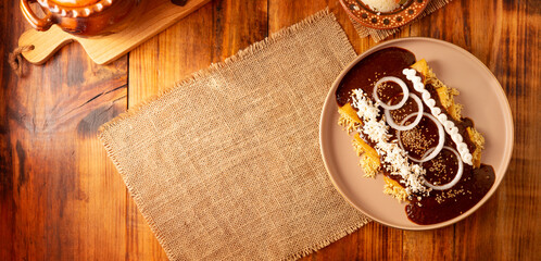 Chicken enmoladas. Also known as mole poblano enchiladas, they are a typical Mexican dish that is very popular in Mexico and the rest of the world.