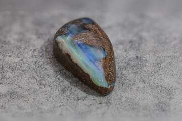 Very-high quality focus bracketing of a Colorful boulder opal gem from Winton Australia