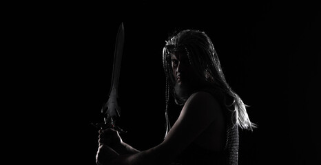 portrait of a male Viking warrior on a black background