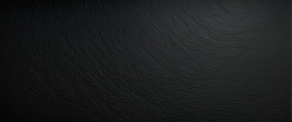 A dark, leathery textured background with a smooth and wrinkled pattern, perfect for elegant and modern designs, presentations, and branding
