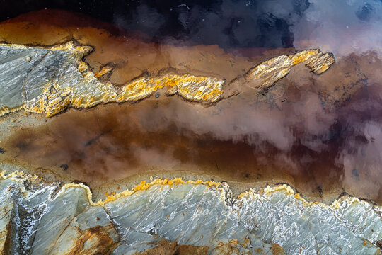 Aerial view of the Riotinto mine, displaying mineral-rich waters