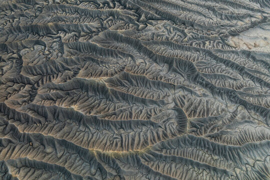 Aerial view showcasing intricate badlands textures