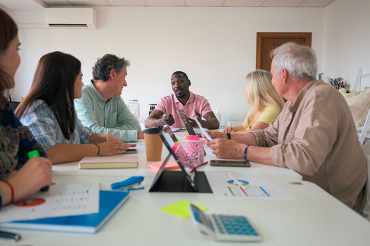 Diverse team engaging in a strategic business meeting