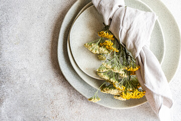 Rustic summer table setting with wild flowers