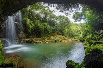 Arsdad falls is the most beautiful waterfall in the in the garden of caves park in cherrapunjee, meghalaya India.
