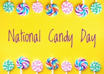 Vibrant and bright yellow poster for National Candy Day, celebrated on November 4th, featuring multicolored lollipops and text