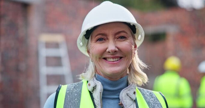 Smile, woman and face of construction worker on site for building, renovation and project management. Happy, portrait and mature female contractor in civil engineering for repairs or maintenance.