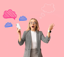 Shocked young businesswoman with modern smartphone on pink background