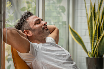 young man at home relaxing on the sofa