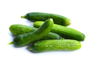 Mini cucumbers on white background.