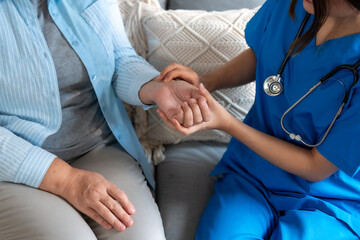 Caring Nurse Providing Home Care Assistance to Elderly Patient with Compassion and Professionalism