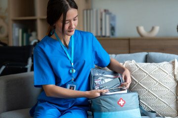 Professional Home Care Nurse Preparing Medical Supplies for Patient Care at Home