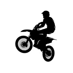 silhouette of motocross rider jumping through the air