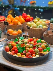 Colourful wax decoration fruit at craft market