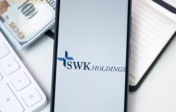 New York, USA - 30 June 2024: SWK Holdings Logo on Phone Screen, Company Icon