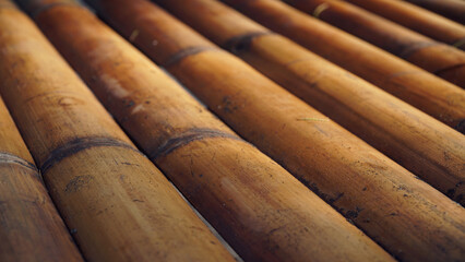 Arrangement of brown bamboo sticks, focus selected
