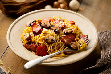 Spaghetti pasta with mushrooms and bacon.
Image of delicious pasta.