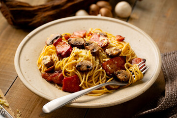 Spaghetti pasta with mushrooms and bacon.
Image of delicious pasta.