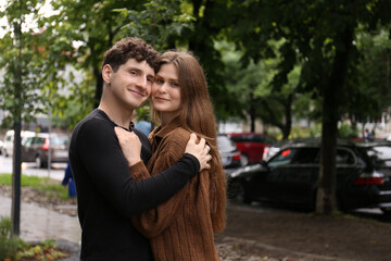 International dating. Lovely young couple spending time together outdoors, space for text