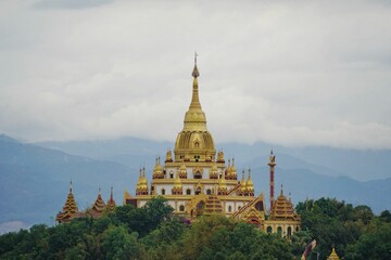 Fototapeta premium Golden Temple in the Mountains