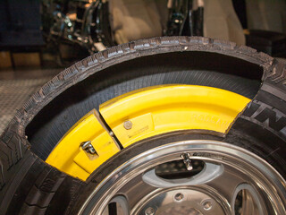 Abu Dhabi, UAE - Feb.23. 2011: R(Run-Flat Technology) tire at IDEX 2011