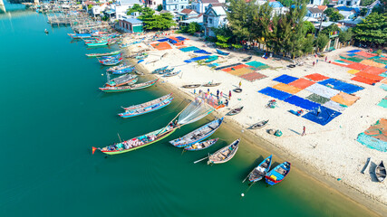 Lang Co Bay, Hue, Vietnam in the morning with a small fishing village peacefully below. It has beautiful lagoons