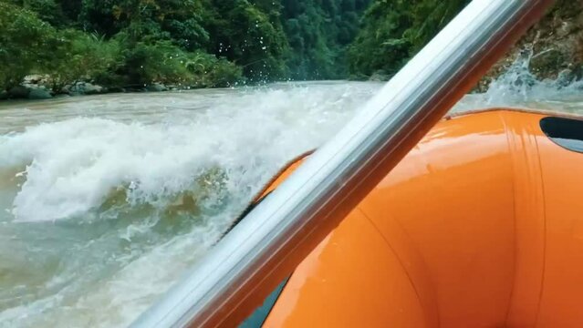 group of people enjoying rafting in the river