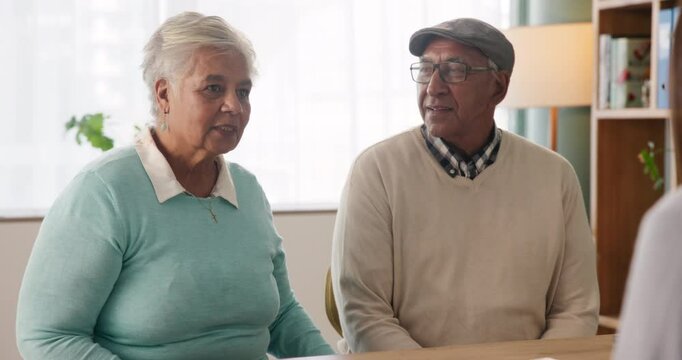 Senior, couple and discussion in office with lawyer for legal consultation, will writing and power of attorney for estate. People, talking and document for trust establishment and retirement planning