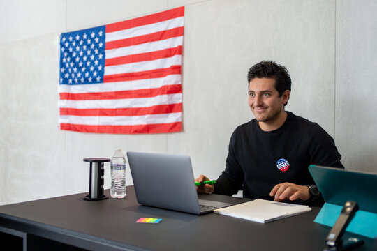 smiling poll worker ready for registration of voters in the us, 2024 election