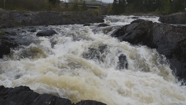 The New Bay River, also referred to as the Mill River, empties into the Southwest Arm of New Bay at Mill Point, located in Point Leamington in Central Newfoundland.
