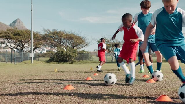 Soccer ball, sports and children dribble for training, workout and exercise for practice, learning and fitness. Youth, field and kids with coach and equipment for playing games, match and competition
