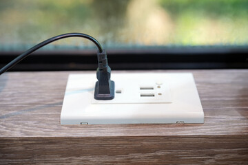 Plug in the power plug into the outlet box.
