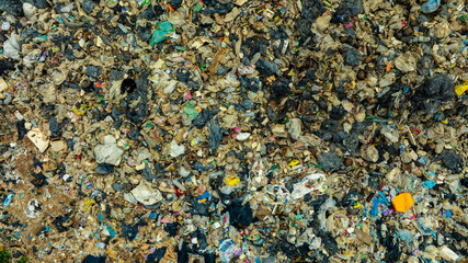 Top view trash, plastic cups and plastic bags at the beach. environmental problem concept and healing the world	
