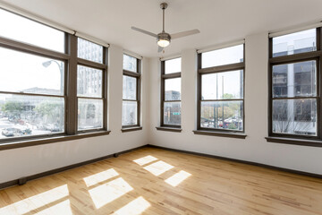Corner Room With Extensive Windows Providing Panorama Of Urban City Life