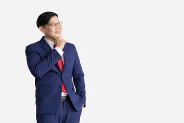Businessman Asian model isolated on white background. Smart male in business suit expression think vision dream.