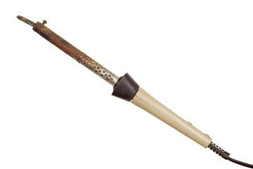 Old electric soldering iron isolated on a white background. Rusty electric soldering iron with plastic handle.