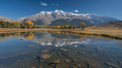 Fototapeta premium A large body of water with a mountain in the background