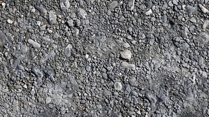 Obraz premium Light grey asphalt texture with fine grains and slight imperfections